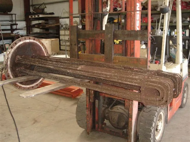 Heat exchanger tube bundle being moved at the works