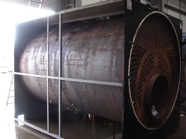 Steam boiler shell in its frame with the front tubeplate exposed