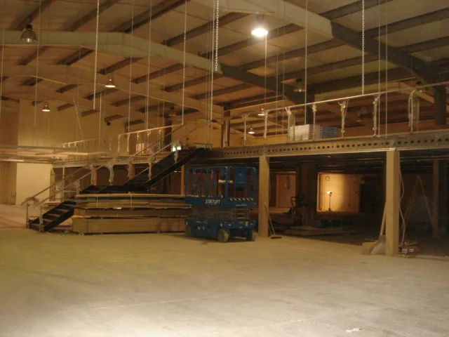 Warehouse mezzanine floor and stairs fabricated by P.J. Guerin
